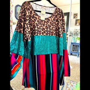 Plus size dressy top with sequins.